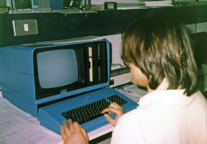 A young Salvo De Luca, the founder, at his first computer, designed and built by himself, with a Z80 processor and CP/M operating system